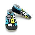 Chaussons homme Enguerrand – Motif guitares noir et turquoise