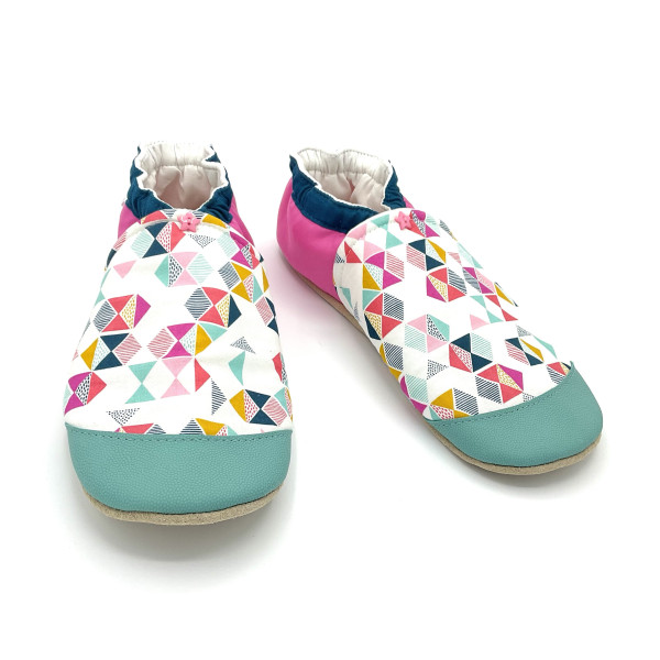 Chaussons en cuir souple aux motifs graphiques
